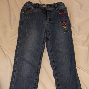 Girls adjustable jeans .